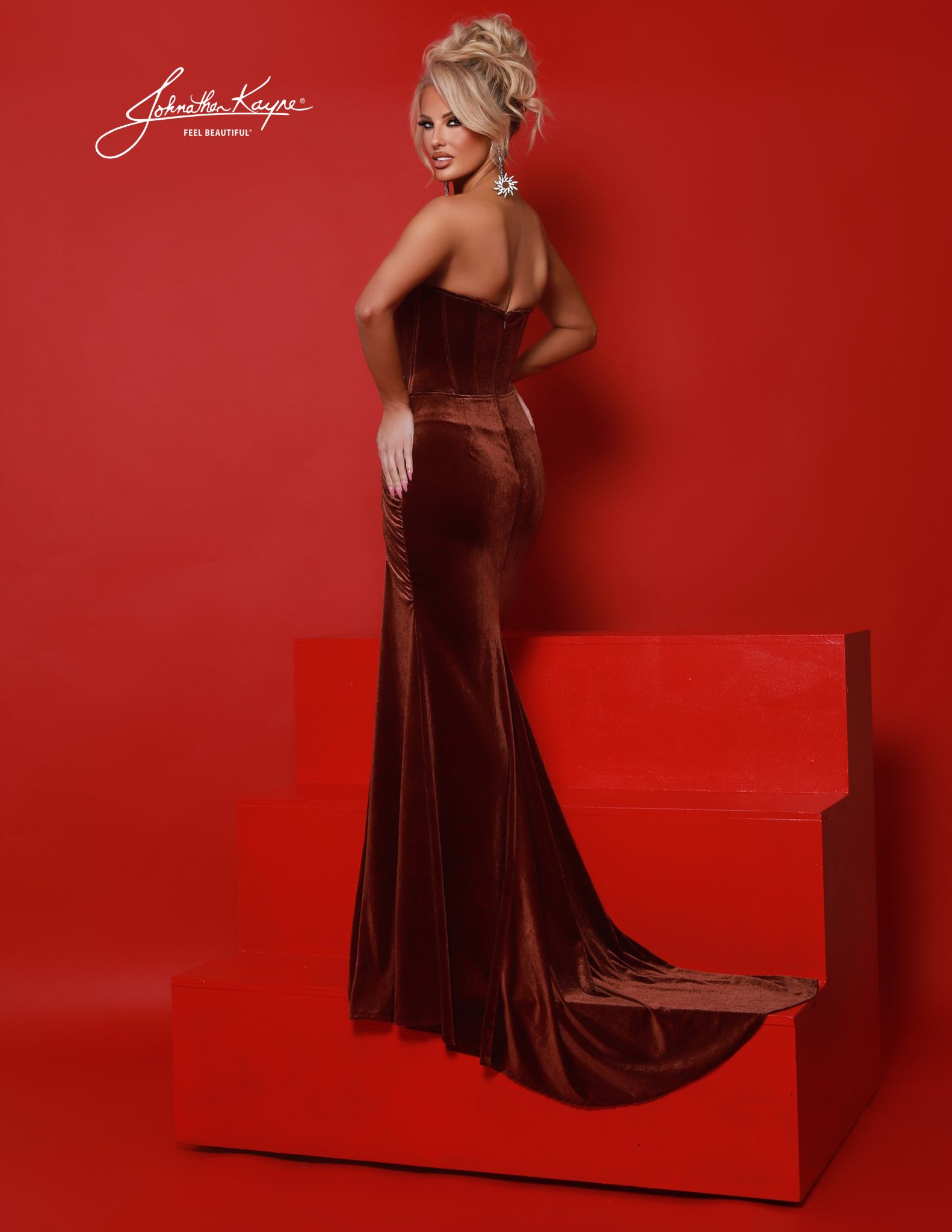 Back view of mocha velvet strapless gown with long train, ideal for pageant stage wear, red carpet, galas, and formals.